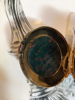 Lot 519 - An antique gold mounted bloodstone circular...