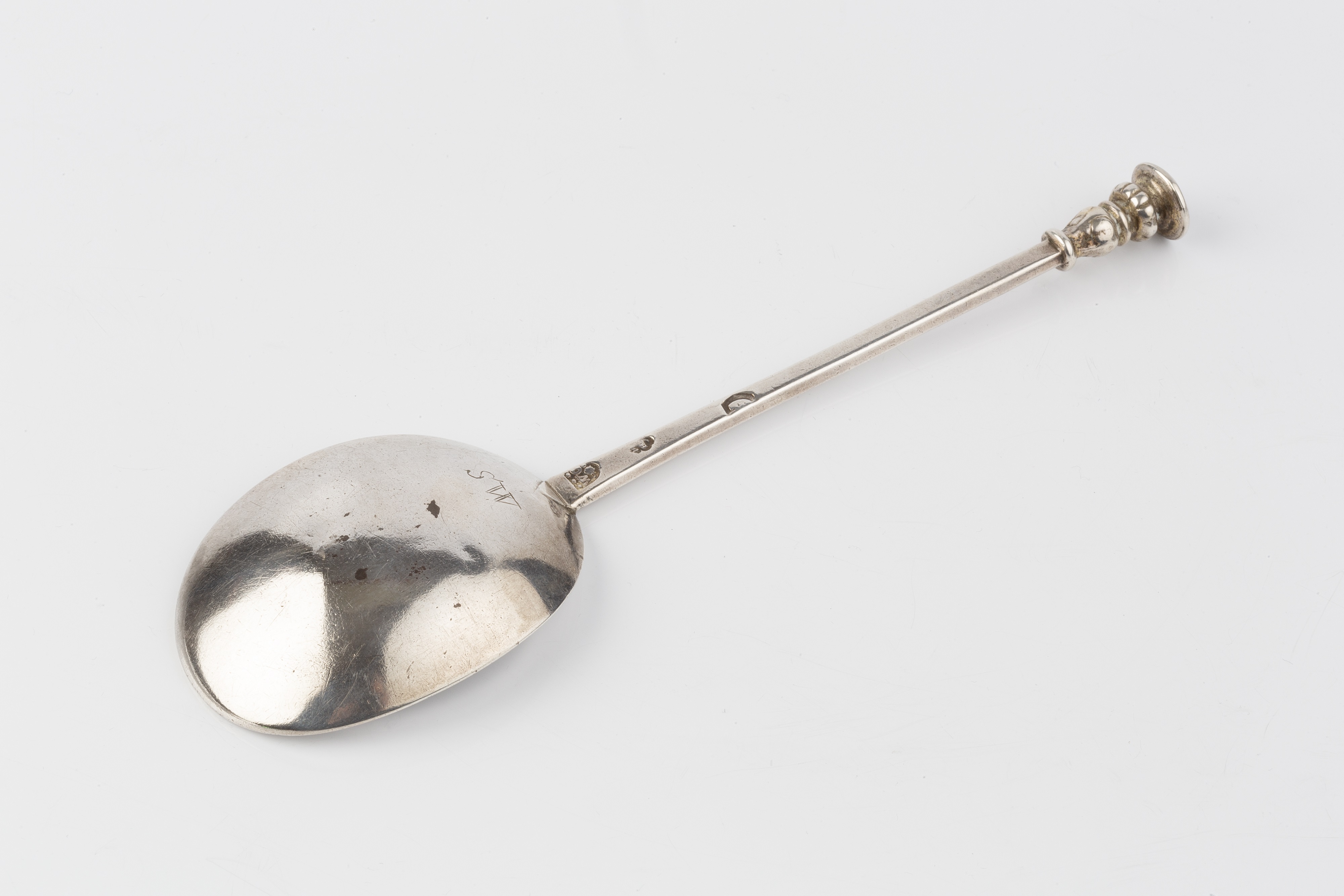 Lot 563 - A Charles II silver seal top spoon, with fig-