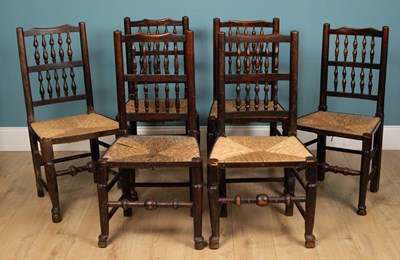 Lot 214 - A set of eight spindle black North Country...