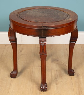 Lot 186 - A Chinese circular table, mahogany, on carved...