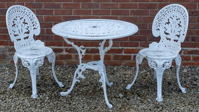 Lot 1195 - A white painted cast aluminium circular garden table and a pair of cast aluminium chairs