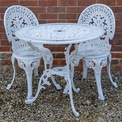 Lot 1195 - A white painted cast aluminium circular garden table and a pair of cast aluminium chairs