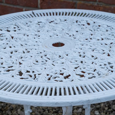 Lot 1195 - A white painted cast aluminium circular garden table and a pair of cast aluminium chairs