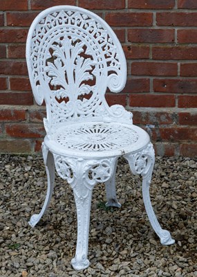 Lot 1195 - A white painted cast aluminium circular garden table and a pair of cast aluminium chairs