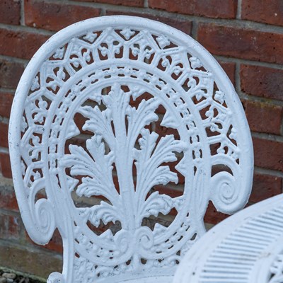 Lot 1195 - A white painted cast aluminium circular garden table and a pair of cast aluminium chairs