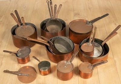 Lot 450 - A collection of 19th century and later English and continental copper saucepans