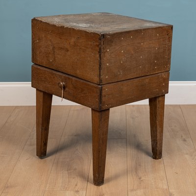 Lot 150 - A 19th century oak square butchers block