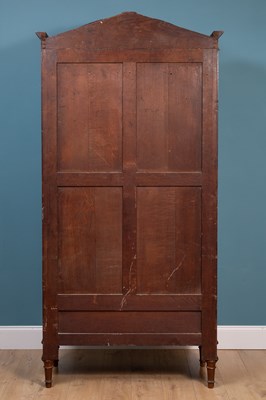 Lot 110 - A late 19th or early 20th century walnut armoire in the neoclassical style