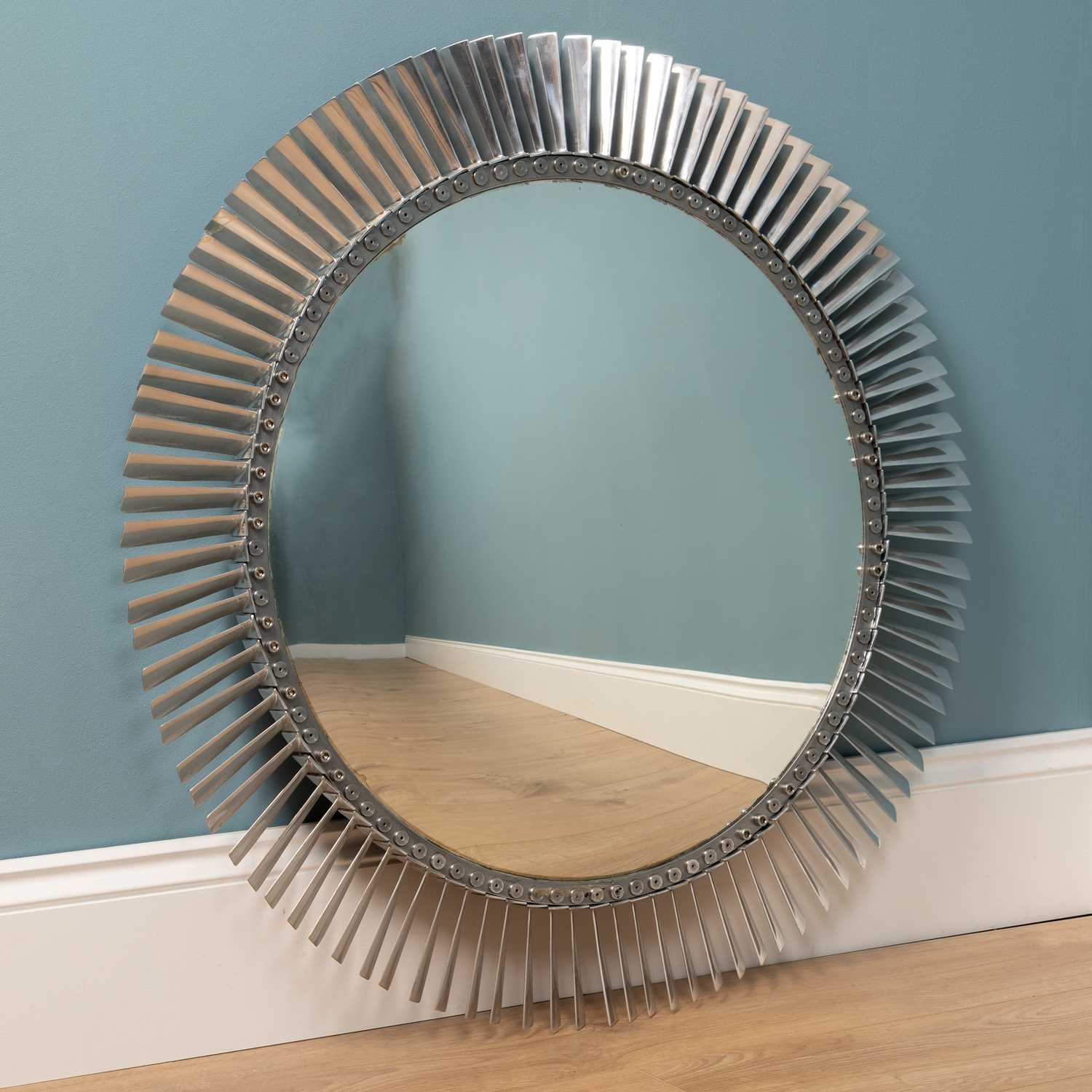 Lot 105 - A convex chrome turbine style wall mirror