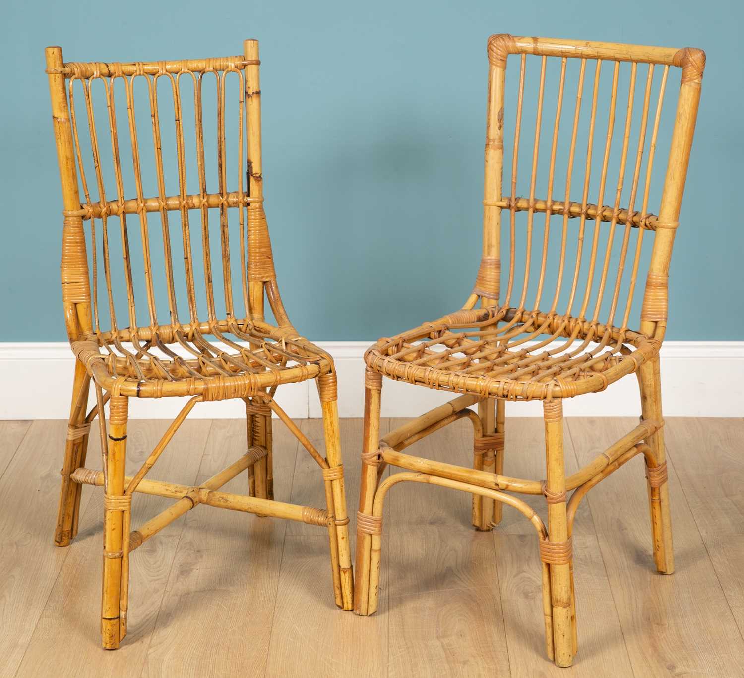 Lot 158 - A pair of faux bamboo wicker dining chairs,...