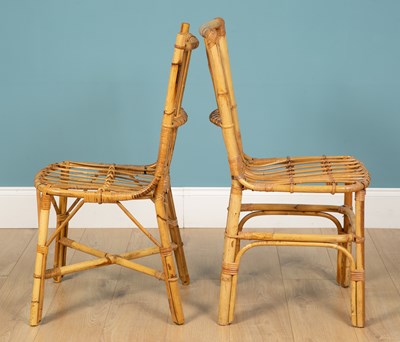 Lot 158 - A pair of faux bamboo wicker dining chairs,...