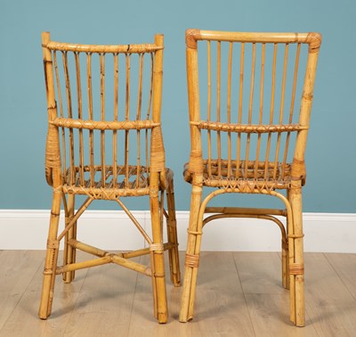 Lot 158 - A pair of faux bamboo wicker dining chairs,...