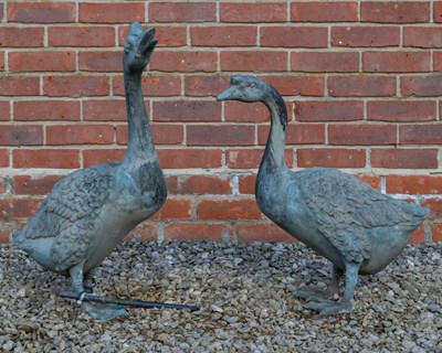 Lot 1087 - A pair of contemporary bronze sculptures of geese