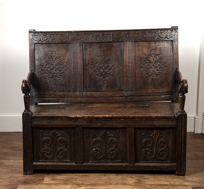 Lot 111 - Carved oak settle 18th Century and later, with...