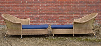 Lot 1081 - A pair of wicker effect sun loungers