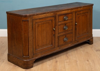 Lot 296 - An early 19th century oak dresser