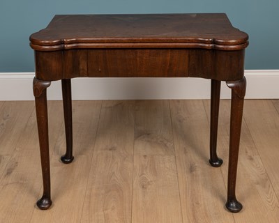 Lot 298 - An 18th century mahogany card table