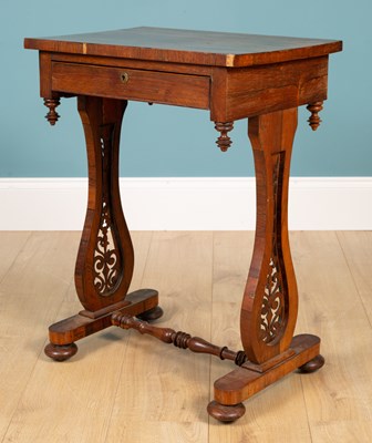 Lot 300 - A 20th century rosewood rectangular occasional table