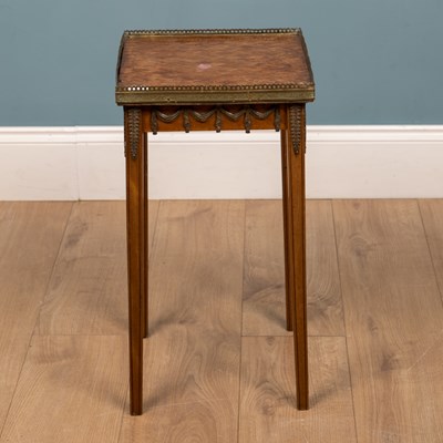 Lot 187 - An early to mid 20th century walnut continental lamp table