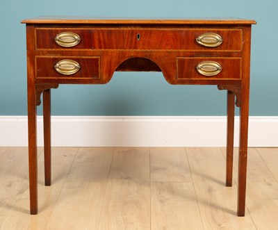 Lot 301 - An antique mahogany and inlaid kneehole side table