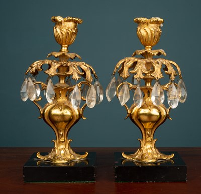 Lot 426 - A pair of antique ormolu candlesticks