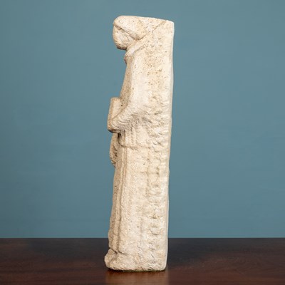 Lot 200 - A carved limestone sculpture of a monk