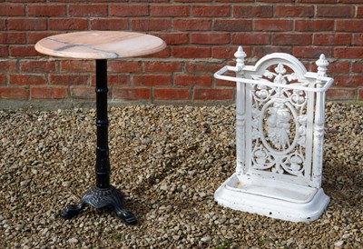 Lot 1135 - A Victorian white painted cast iron stick stand and a marble-topped cast iron occasional table