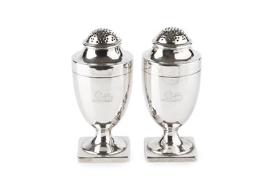 Lot 640 - A pair of George III silver urn shaped castors,...