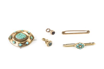 Lot 212 - A Victorian turquoise set panel brooch, the...