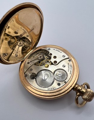 Lot 172 - A 9ct gold half hunter pocket watch, the white...