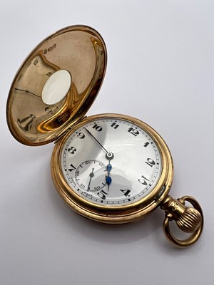 Lot 172 - A 9ct gold half hunter pocket watch, the white...