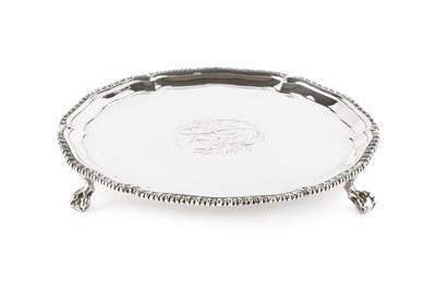 Lot 648 - A George III silver circular waiter, with...