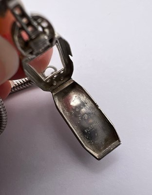 Lot 119 - A diamond set cocktail watch by Longines, the...