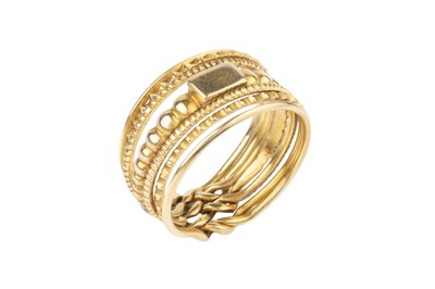 Lot 11 - A puzzle ring, designed as seven entwined...