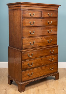 Lot 134 - An 18th century chest on chest, oak with...