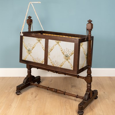 Lot 138 - A wooden cot, with an attachable mahogany...