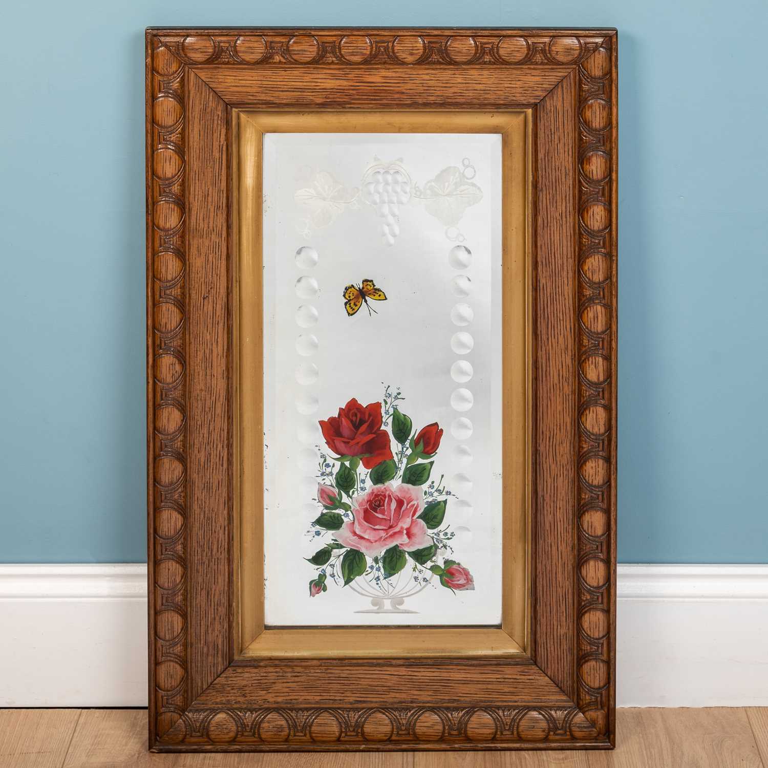 Lot 20 - A gypsy mirror, decorated with flowers, oak...