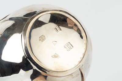 Lot 675 - A Channel Islands silver milk can and cover,...