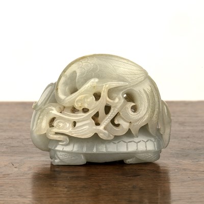 Lot 214 - White nephrite pebble pierced and carved as a...