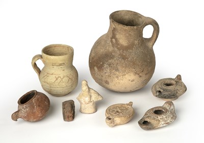 Lot 256 - A group of ancient artefacts to include three...