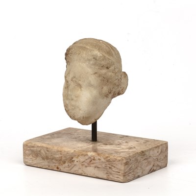 Lot 278 - A Roman marble female head, 4cm wide x 6cm high