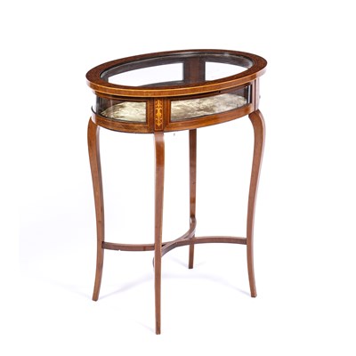 Lot 294 - An Edwardian mahogany bijouterie table of oval...