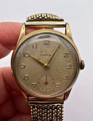 Lot 305 - A 9ct gold cased wristwatch, the circular dial...