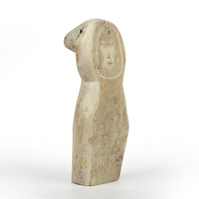 Lot 261 - An antique Inuit carved whale bone sculpture...