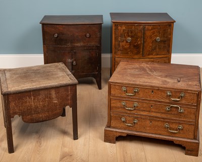 Lot 243 - A group of four commodes of varying sizes and...