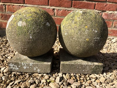 Lot 1197 - A pair of cast reconstituted stone ball finials