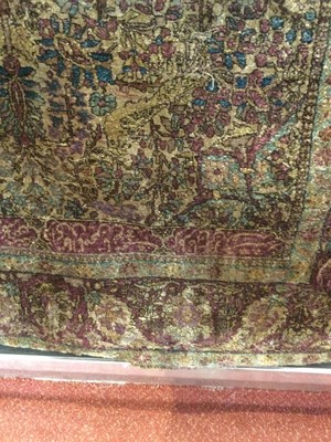 Lot 264 - An antique Persian silk rug with a banded...