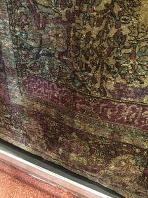 Lot 264 - An antique Persian silk rug with a banded...