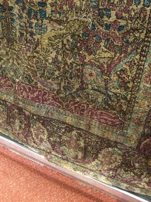 Lot 264 - An antique Persian silk rug with a banded...