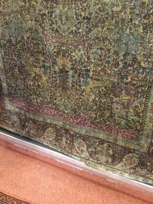 Lot 264 - An antique Persian silk rug with a banded...